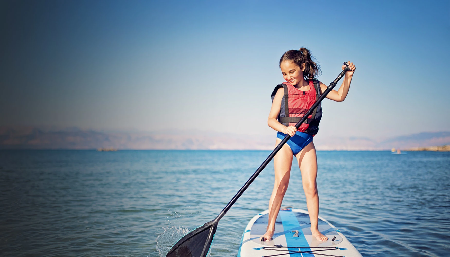 bandeau enfant souriant paddle